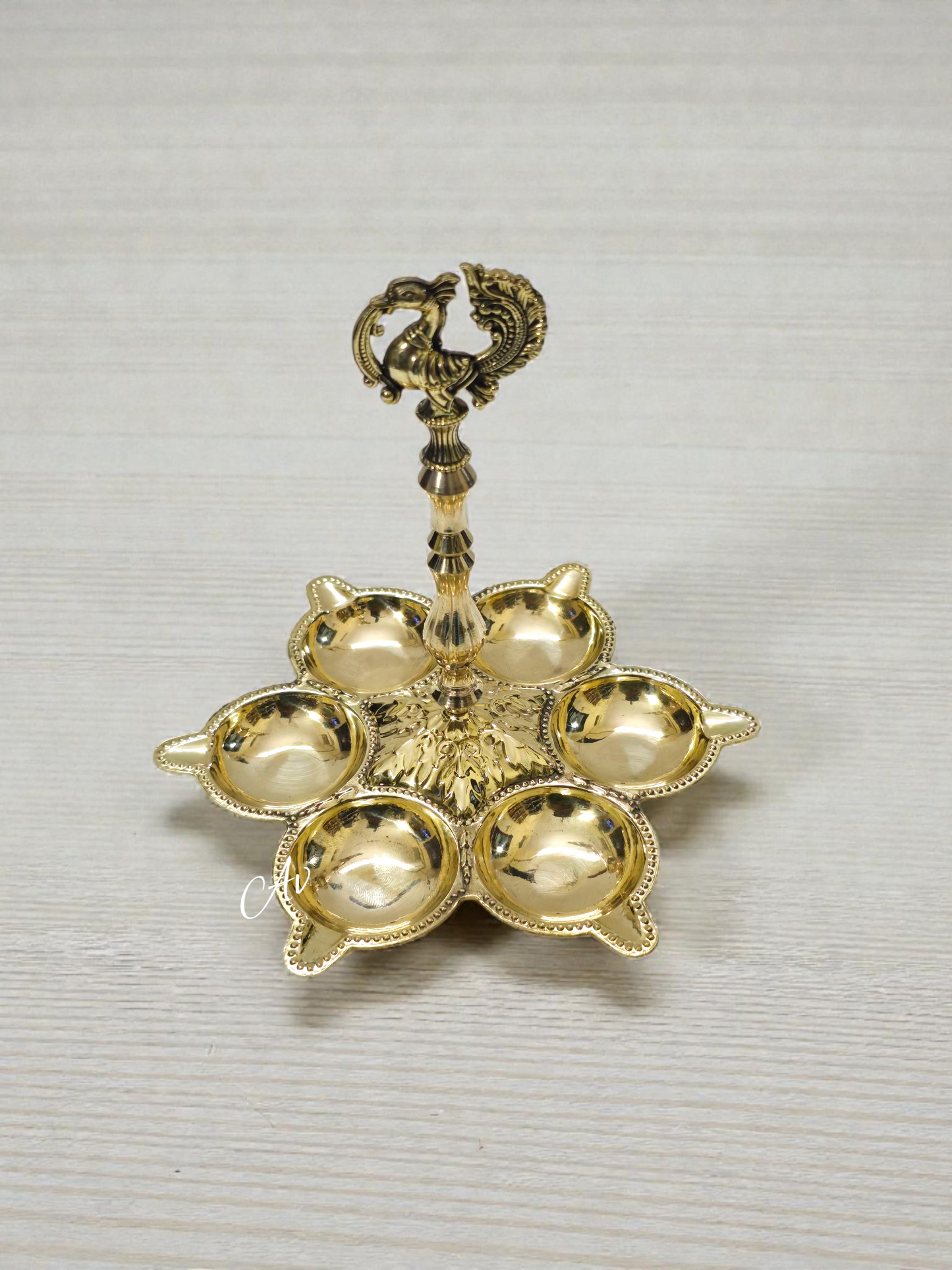 Brass peacock diya